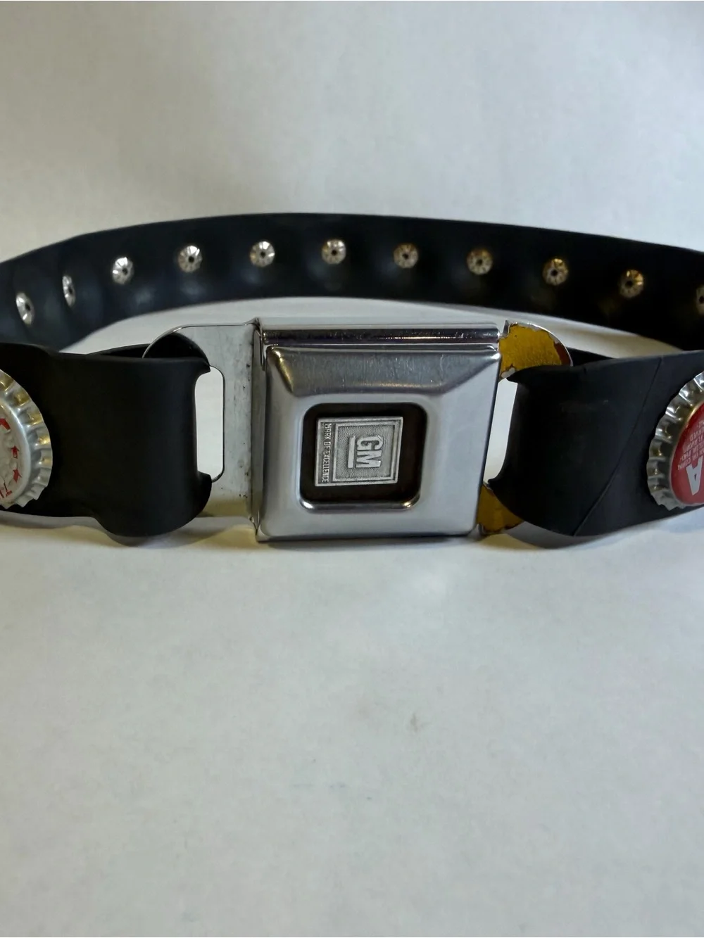 Vintage GM Seat Belt Bottle Cap Belt Mark of Excellence Chevrolet Hot Rod